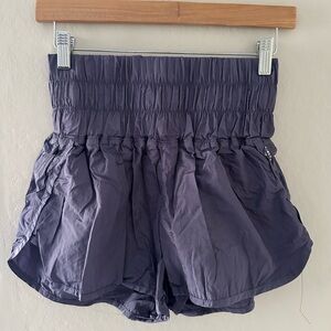 FP Movement by Free People Smocked Waist Athletic Shorts in Deep Purple